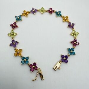 ~7.25" Multi-stone "flower" 14kt yellow gold tennis bracelet!